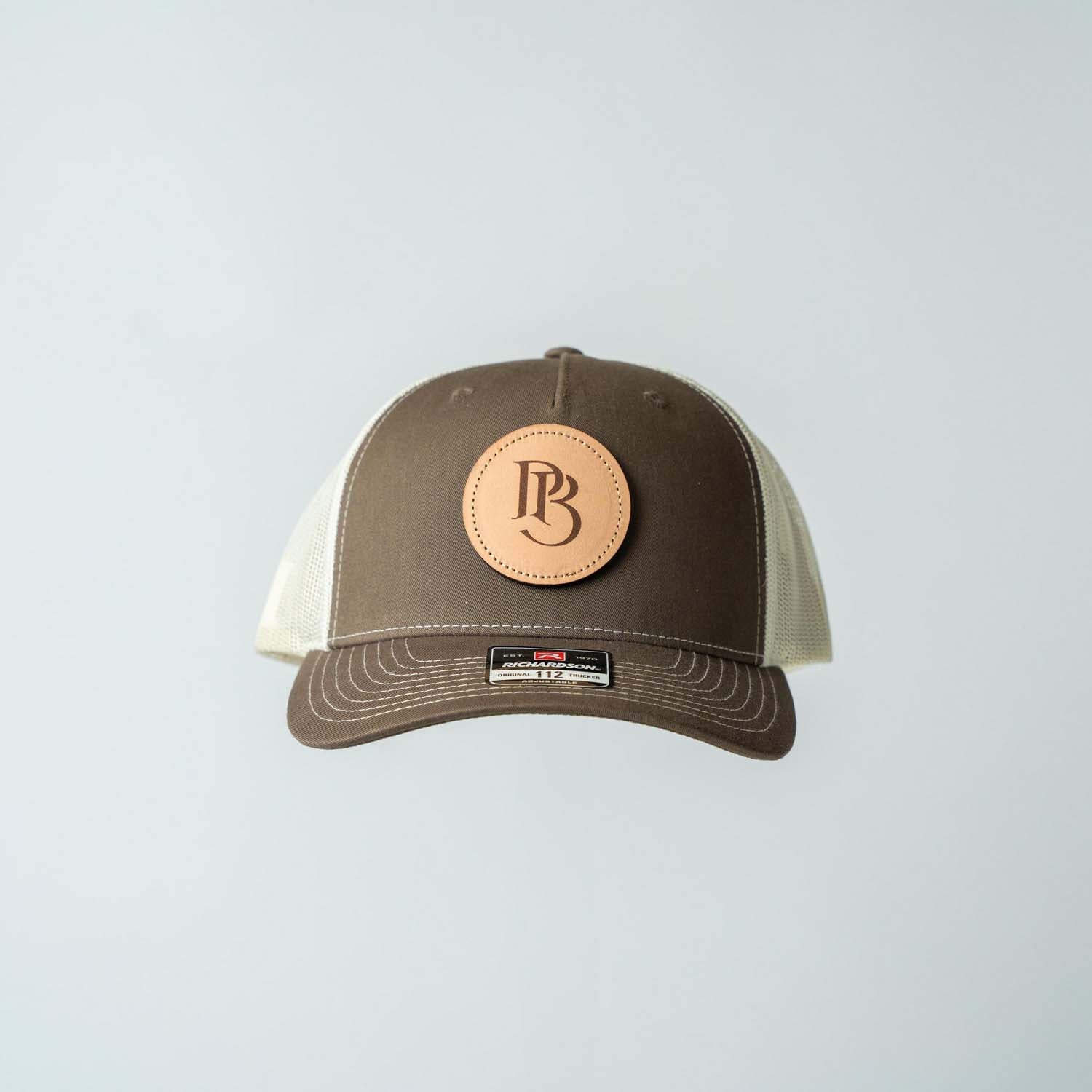 Trucker Hat | Chocolate Chip & Burch | Circular Monogram Logo Patch