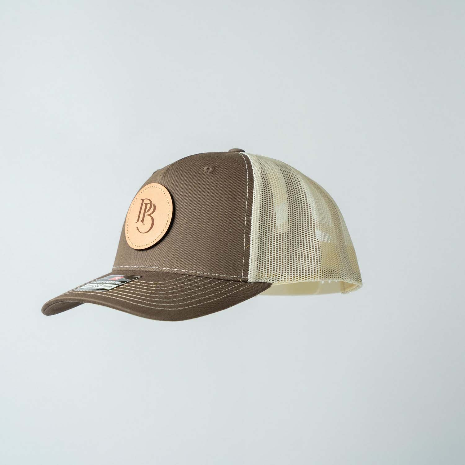 Trucker Hat | Chocolate Chip & Burch | Circular Monogram Logo Patch