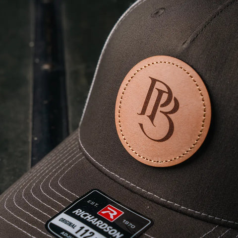 Trucker Hat | Chocolate Chip & Burch | Circular Monogram Logo Patch